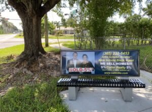 Real estate sign in a yard advertising homes for sale in Orlando.