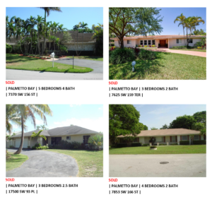 Four single-story houses with well-maintained lawns and palm trees under clear skies.