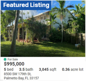 Spacious 5-bedroom, 3.5-bath home with lush landscaping and palm trees.